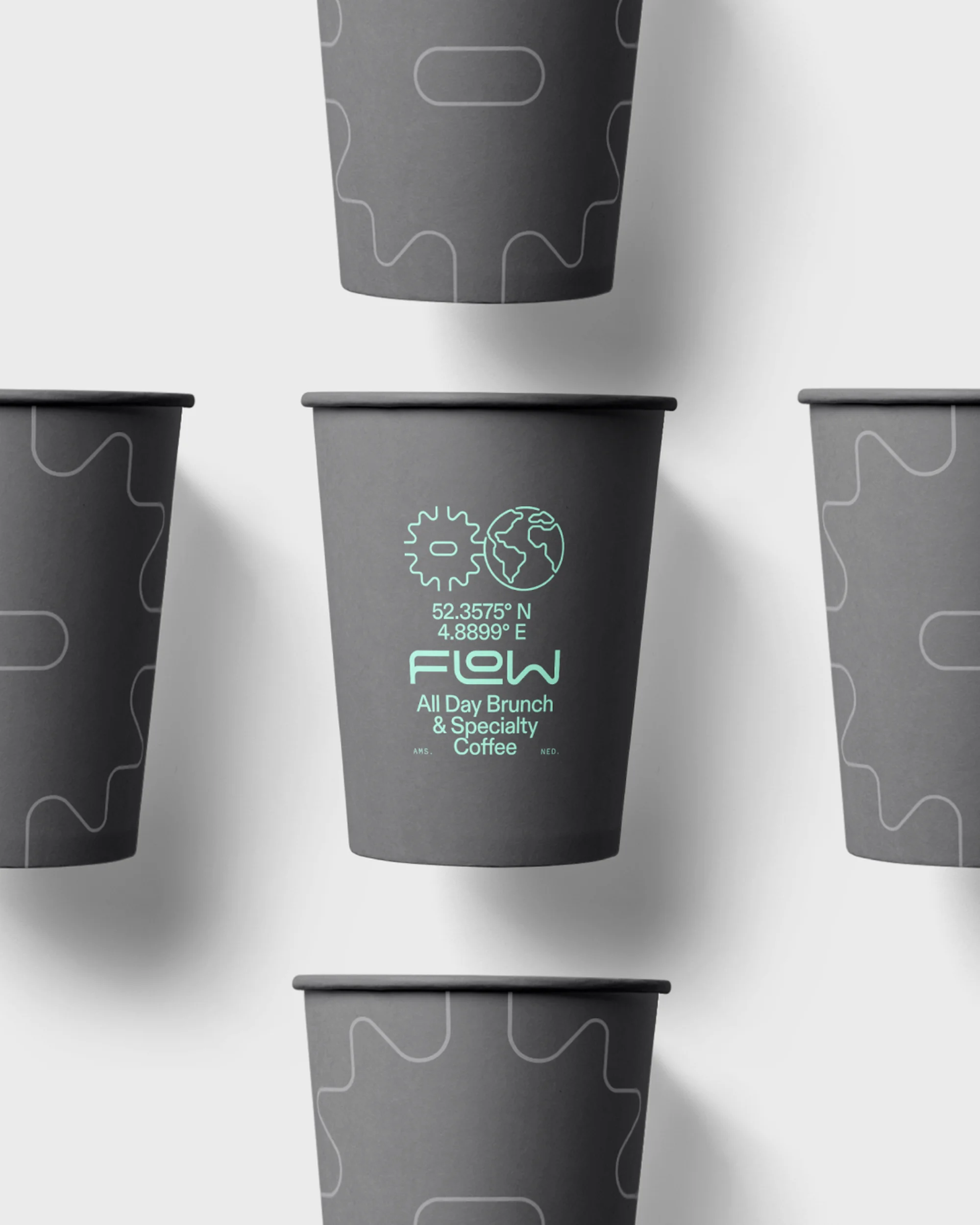 Multiple gray paper coffee cups arranged in a pattern on a white surface, featuring the 'FLOW' logo and decorative gear and world graphics.