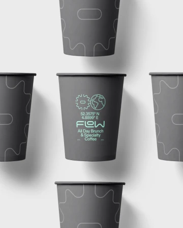 Multiple gray paper coffee cups arranged in a pattern on a white surface, featuring the 'FLOW' logo and decorative gear and world graphics.