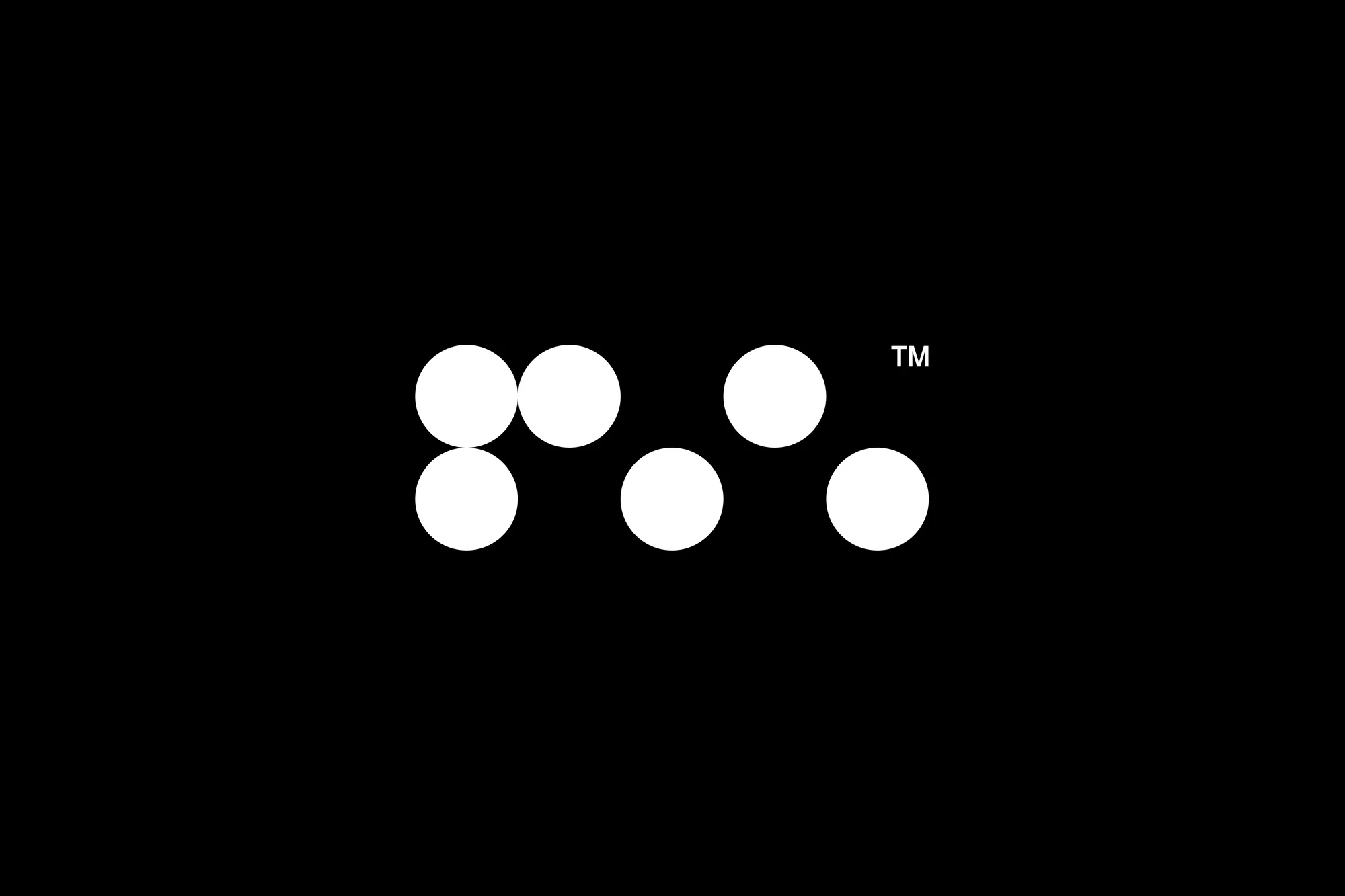 Abstract image with seven white circles arranged in a geometric pattern over a solid black background; minimalistic graphic design with trademark.