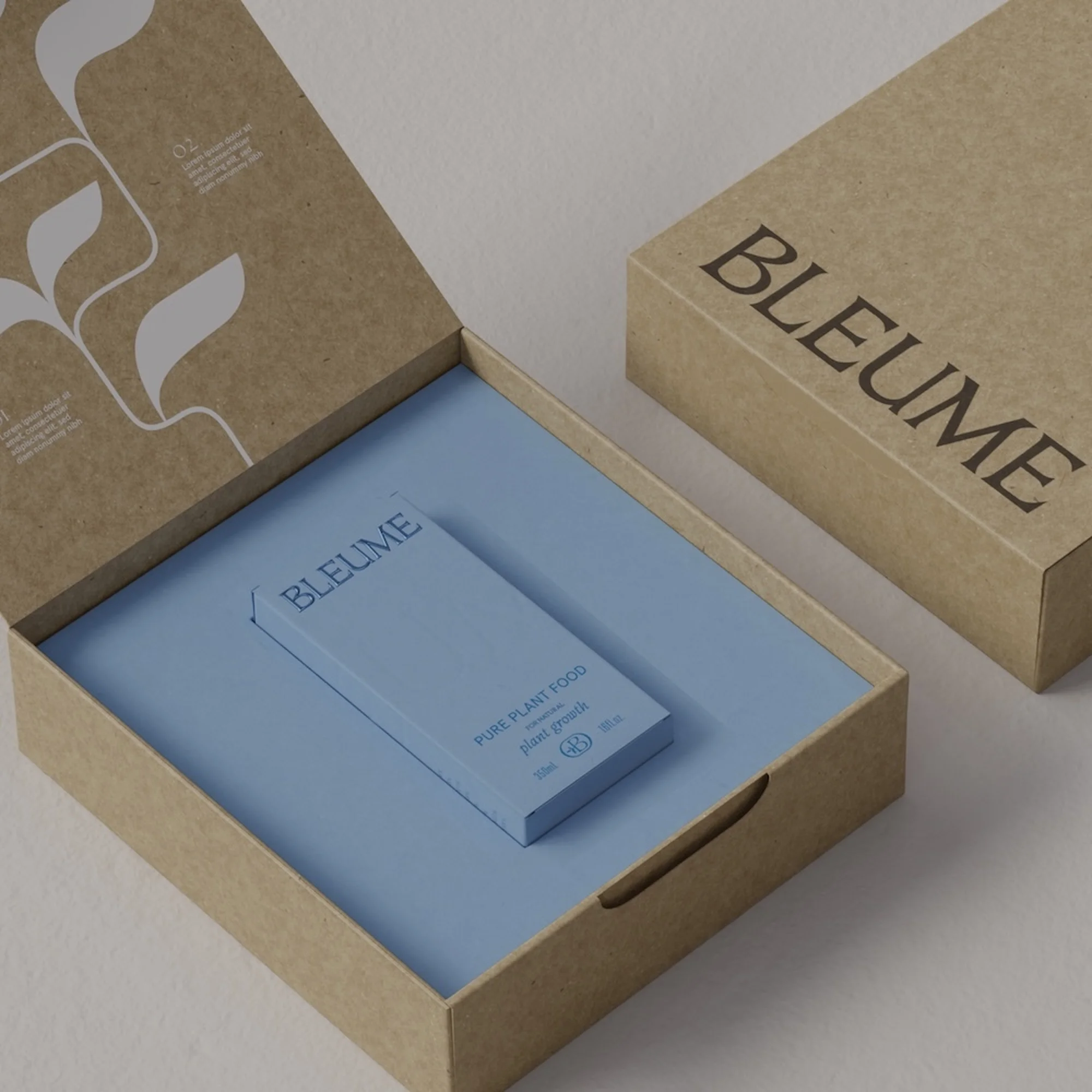 Product packaging featuring a light blue box within an open, natural cardboard box, showcasing a minimalist design for plant food products.