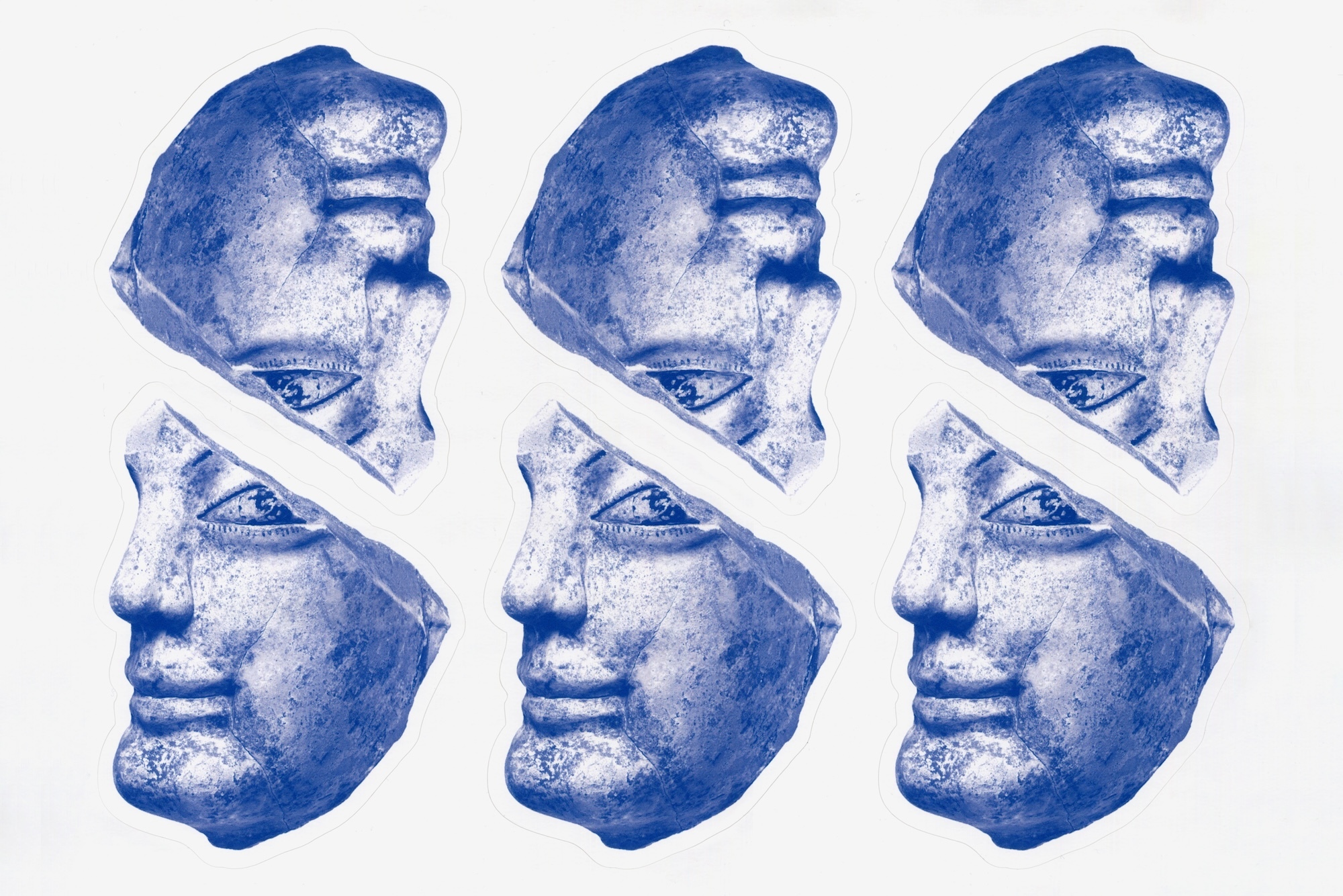Six blue stone bust fragments arranged on a white background, showcasing detailed carving and textured surfaces with antique aesthetic.