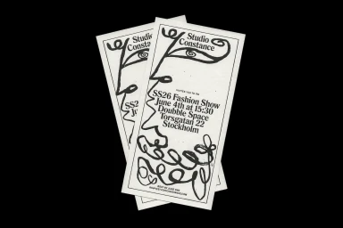 Two printed invitation cards featuring black line illustrations and typography against a solid black background.