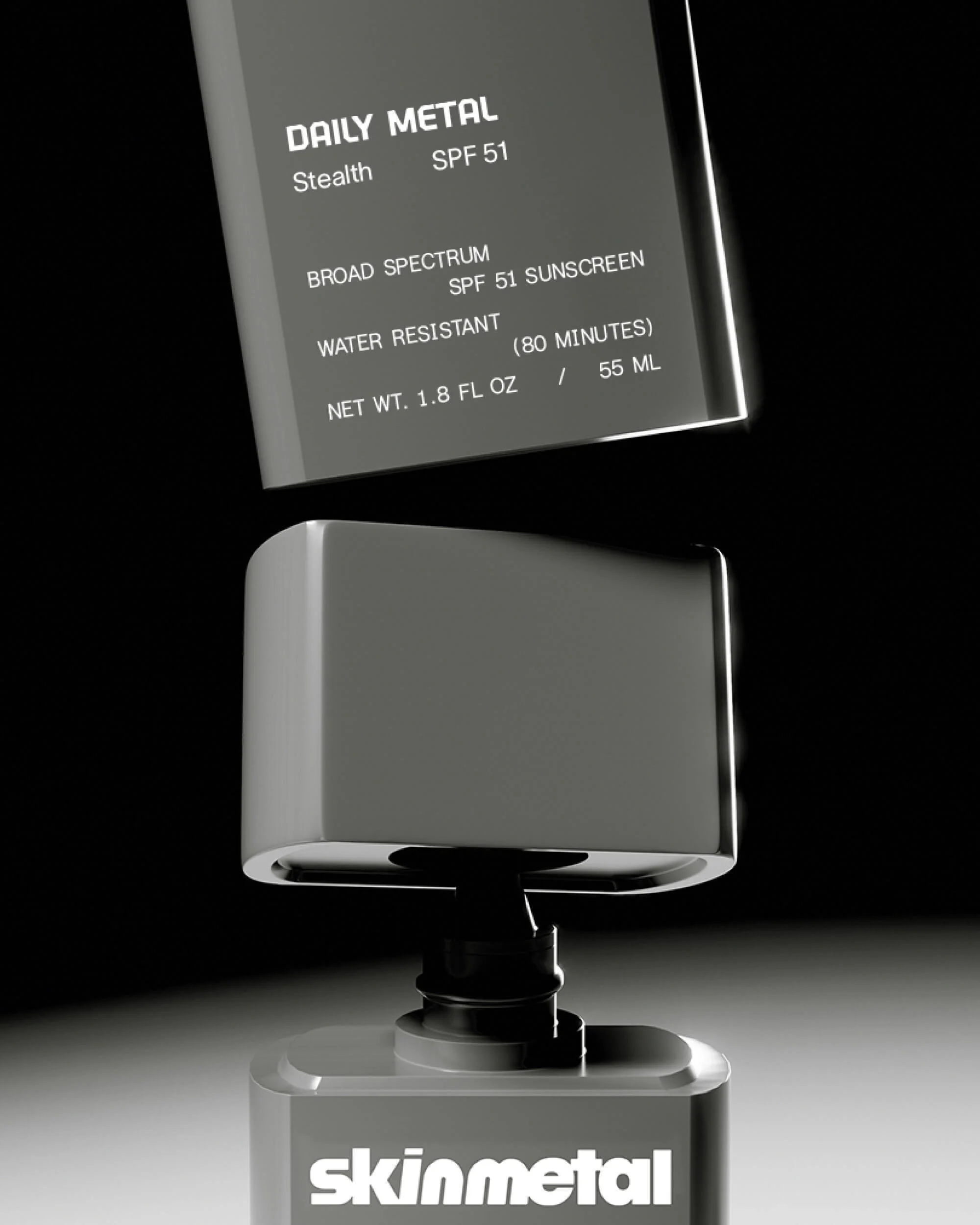 Two gray sunscreen bottles, one hovering above the other, are captured in a studio-lit shot against a dark background. Product is Daily Metal.