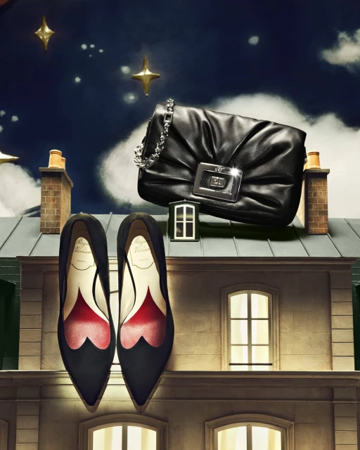 Elegant black leather handbag and high-heeled shoes displayed on a rooftop with a night sky backdrop and star accents.