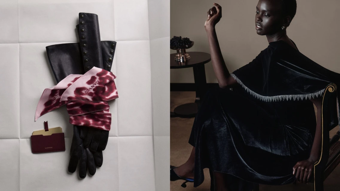 Fashion shot featuring an African American model in a black dress next to a pair of leather gloves and a patterned scarf.