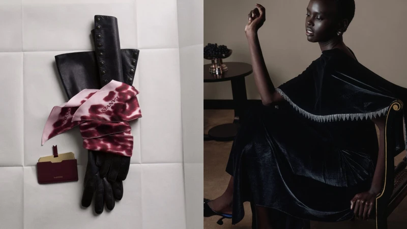 Fashion shot featuring an African American model in a black dress next to a pair of leather gloves and a patterned scarf.