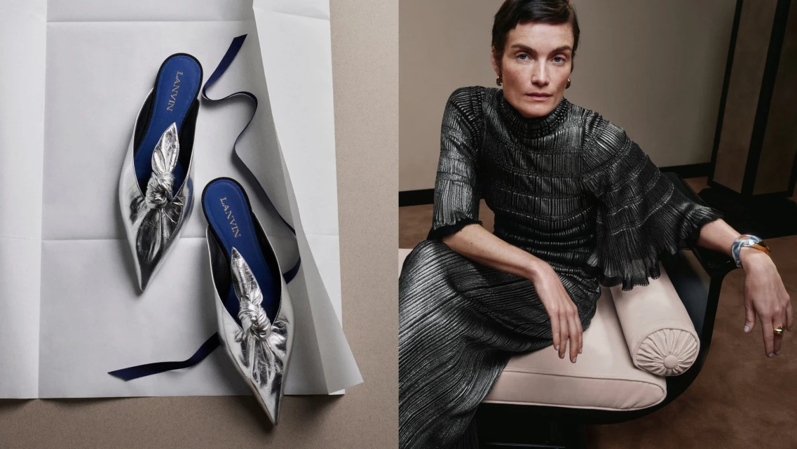 Fashion editorial shot showcases Lanvin heeled mules on white paper and a seated woman in a metallic pleated outfit.