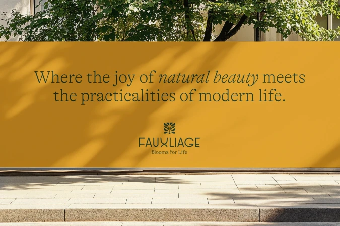 Outdoor advertising billboard displaying the text 'Where the joy of natural beauty meets the practicalities of modern life' and the brand FAUXLIAGE.
