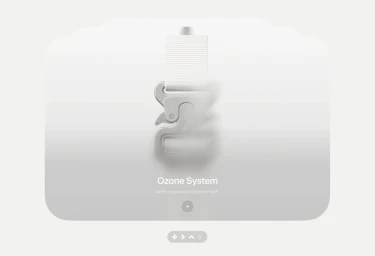 Close-up of a metallic buckle attached to a white strap on a smooth gradient background for the Nube brand identity project.