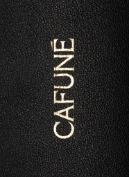 Close-up product shot of gold debossed Cafuné brand logo on black textured leather surface