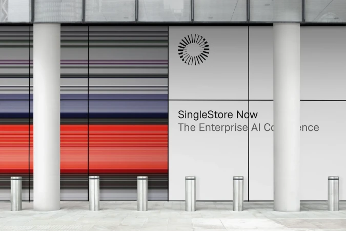 SingleStore Now branding displayed on a modern building exterior with vertical white columns and striped graphic panels.