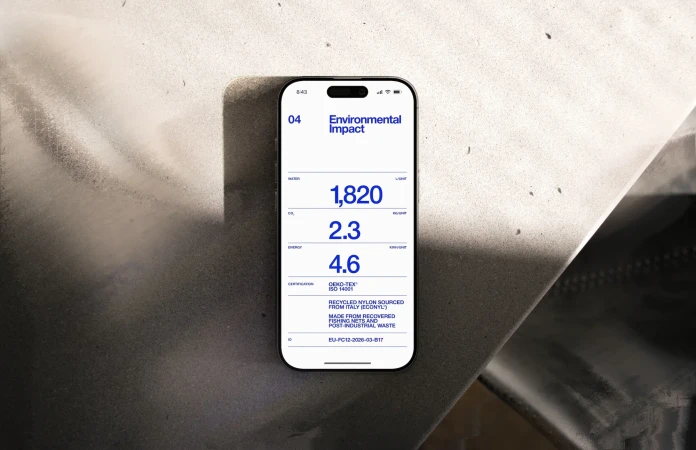 IPhone displaying environmental impact data against a mottled gray backdrop, highlighting sustainability and tech integration.