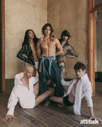 Five male models posing together indoors against a distressed wall for Attitude Magazine New Wave project.