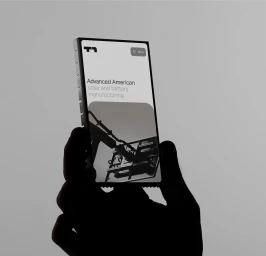 Close-up silhouette of a hand holding a mobile device displaying a website interface against a seamless light background.
