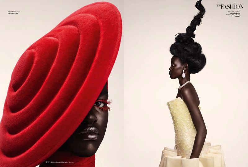 Fashion editorial featuring an African American female model in a red sculptural hat and dramatic makeup, plus a model in profile wearing high fashion.