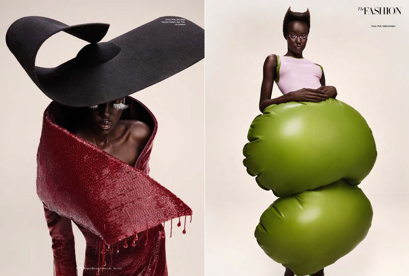 Fashion editorial shot featuring two dark-skinned adult female models wearing avant-garde hats and sculptural dresses against a neutral backdrop.