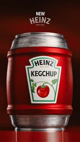 A red barrel-shaped can labeled 'HEINZ KEGCHUP' with a tomato graphic against a dark red background.