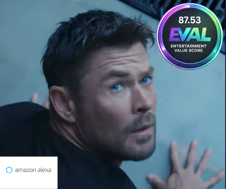 Close-up of adult male with short dark hair, blue eyes, and fair skin. Man appears to be in a commercial for Amazon Alexa.