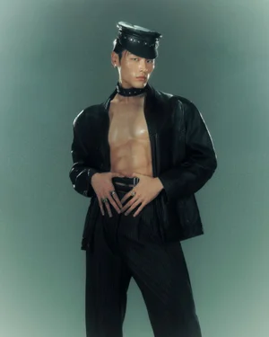 Model Craig Uy wearing a leather jacket and cap for Fucking Young, part of the project Craigs Bizarre Adventure