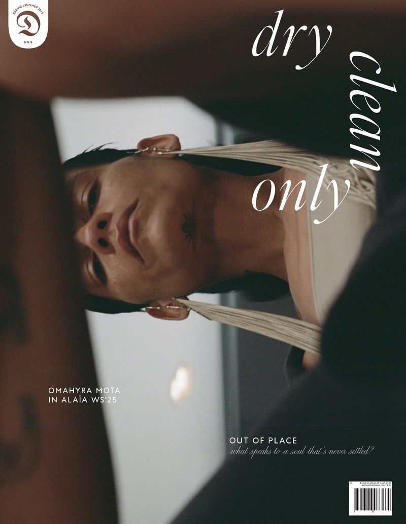 Fashion magazine cover featuring model Omahyrh Mota, with the title 'Dry Clean Only'. The portrait-oriented cover is shot with soft lighting.
