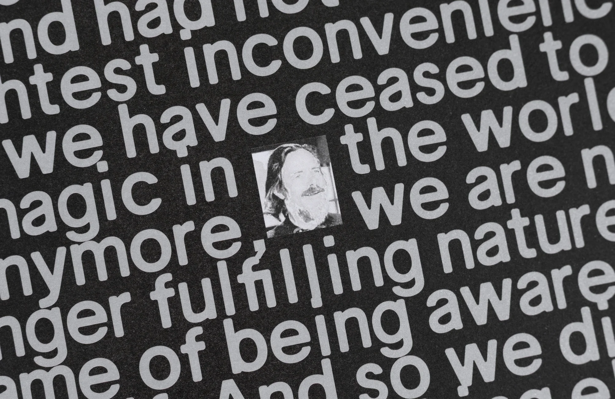 Black and white image with gray-scale portrait among white text. Includes phrases like 'magic in the world' and 'we are nature'.