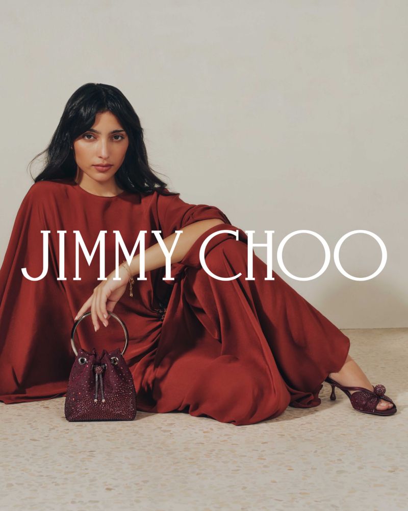 Indoor shot features a woman in a red dress holding a sequin bucket bag and wearing heels, alongside the Jimmy Choo logo.