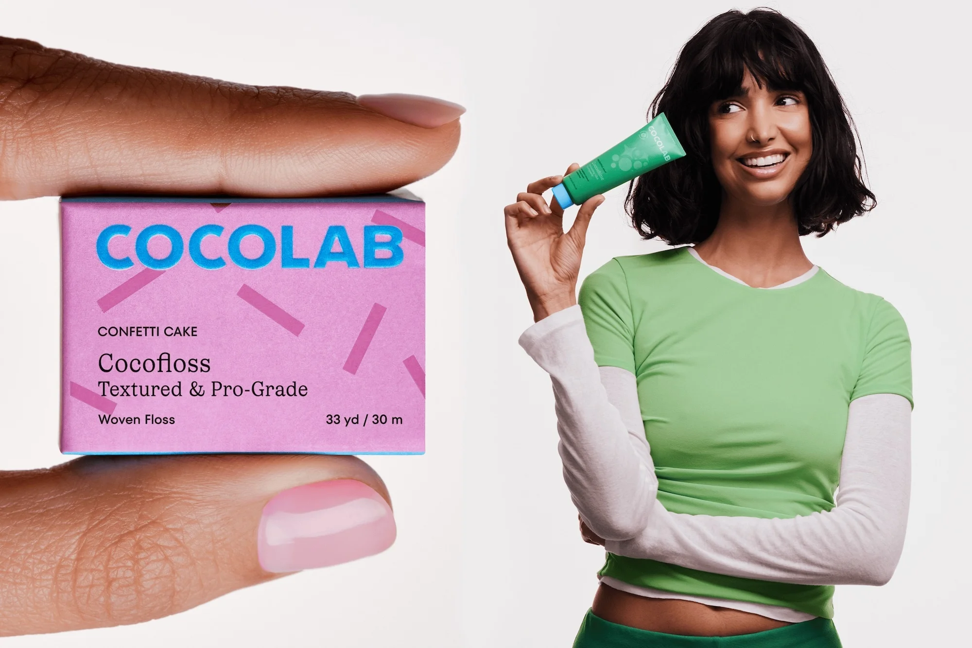 Woman holds Cocofloss dental product box and tube against a white backdrop in a beauty and personal care product advertisement.