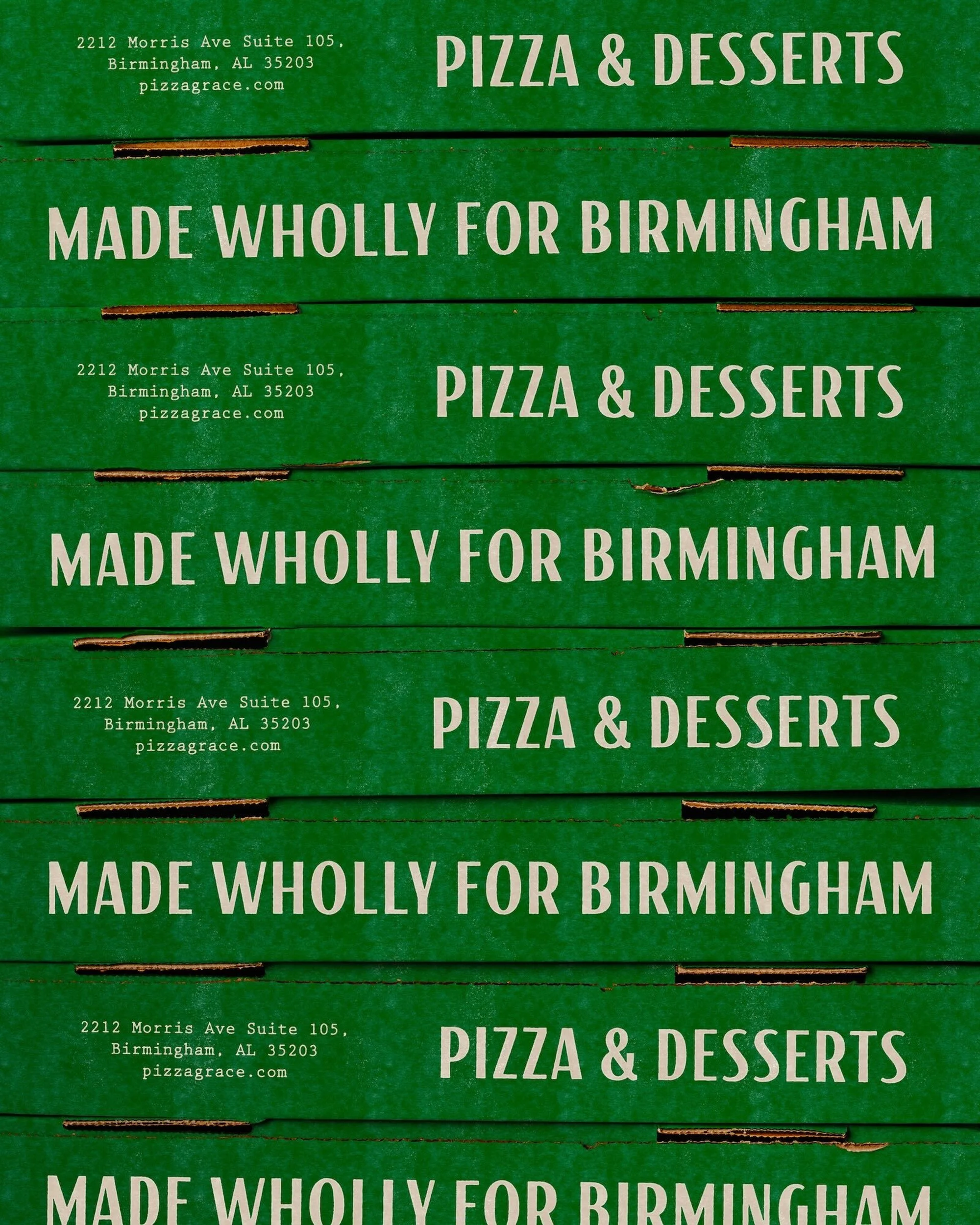 Stack of green pizza boxes with white text showcasing a promotional message and the words Pizza & Desserts, presenting a culinary offering.