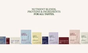 A lineup of various Daily Spoon supplement pouches and boxes displayed neatly against a clean light background with centered typography