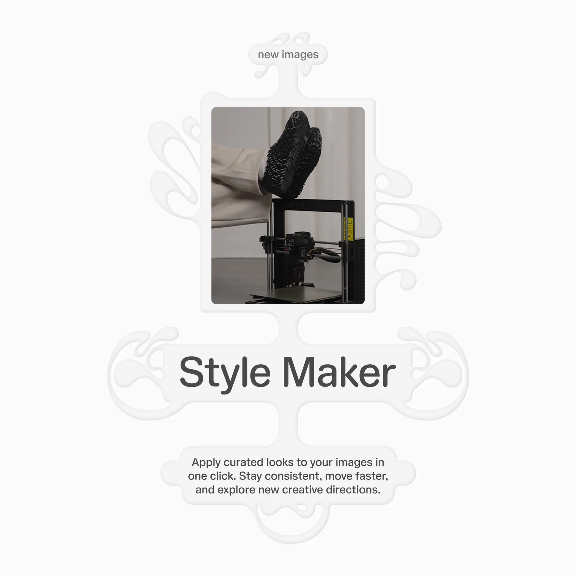 Image of a 3D printer with a shoe-like object on top of it, placed on a table against a neutral background.