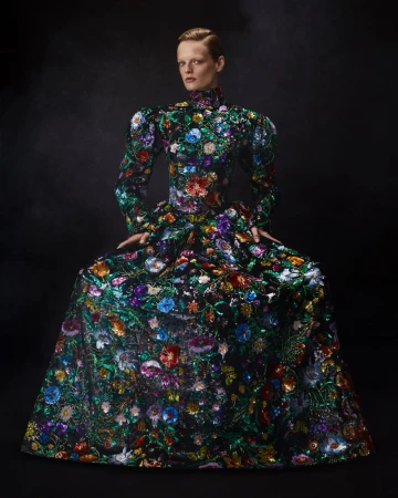 Model Hanne Gaby Odiele wearing a heavily embellished floral gown against a dark background for Vogue Mexico