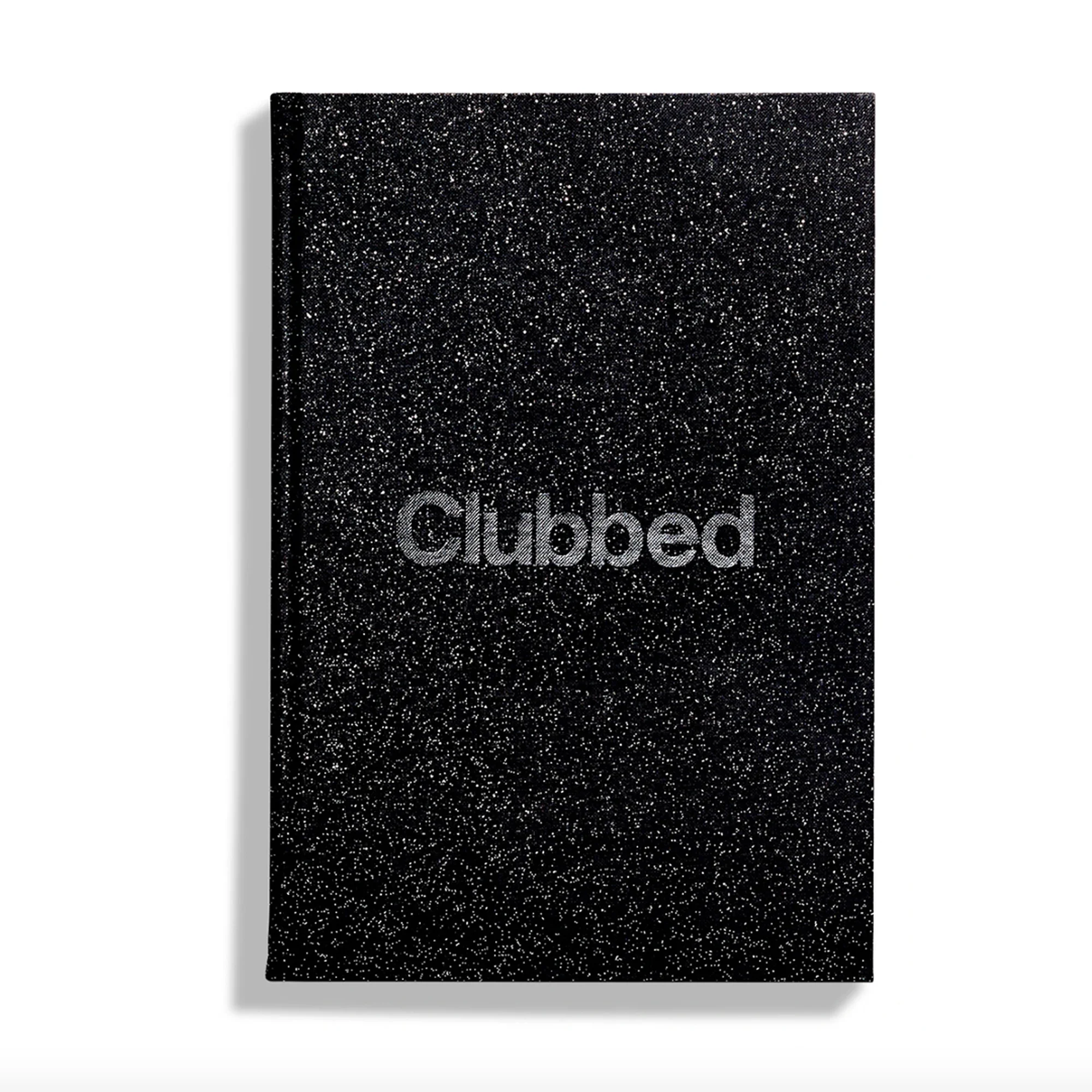 A closed hardcover book with the title 'Clubbed' is centered against a clean white background, emphasizing its textured, dark aesthetic.