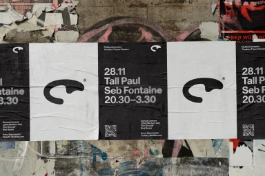 Monochrome event posters for Clubbed featuring typography and abstract logo pasted on a weathered outdoor wall surface.