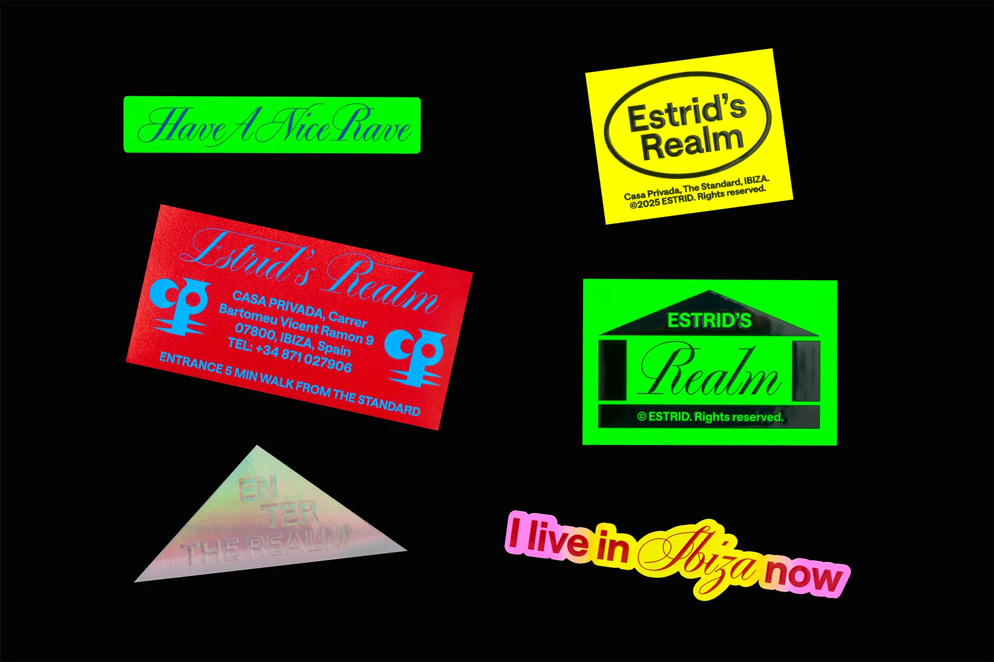 Colorful stickers with text and logos on a black background, promoting 'Estrid's Realm' and Ibiza, creating a playful and vibrant visual.