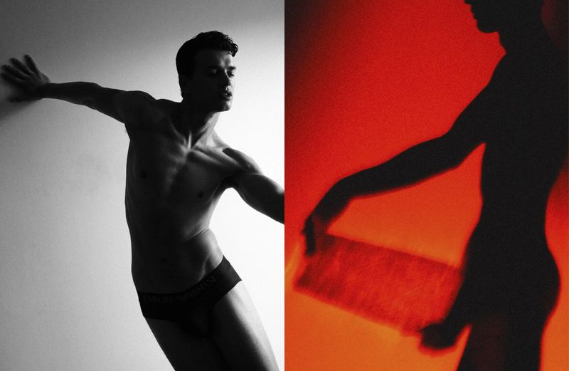 Black and white image: torso of male model in underwear with arm extended; next to shadowy male torso silhouette on orange background.
