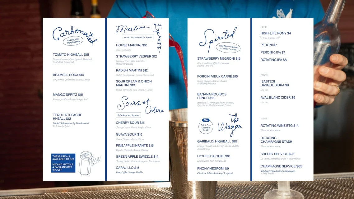 A cocktail menu features various beverages with handwritten-style fonts, showcasing drink names, prices, and ingredients at a bar setting.