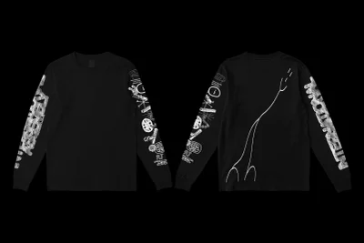Front and back views of a black long-sleeve t-shirt featuring white graphic prints on the sleeves and back.