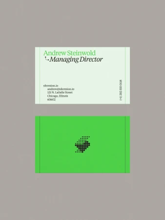 Two business cards, one light green with contact information, the other bright green with a black, geometric design.