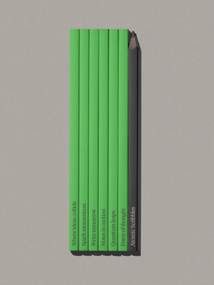 Group of six green pencils and one black pencil aligned vertically with typography on each against a grey background