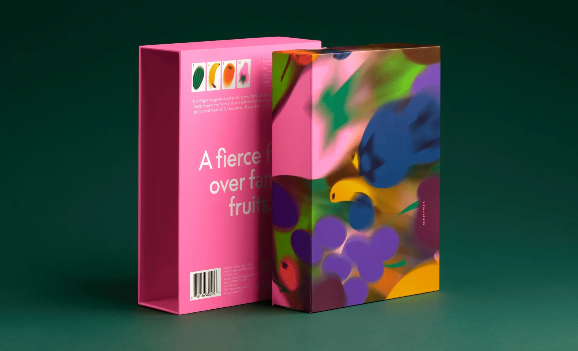 Two game boxes are displayed against a green background, one pink with text, the other with a colorful abstract fruit pattern.