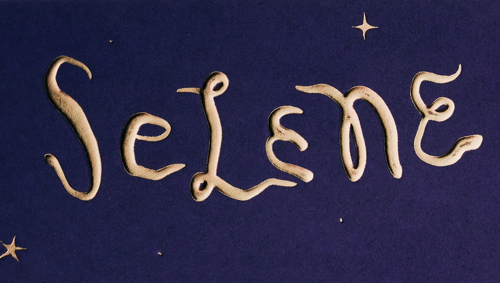 Stylized text art: the name 'Selene' in embossed, gold-toned letters on a deep blue background with faint stars.