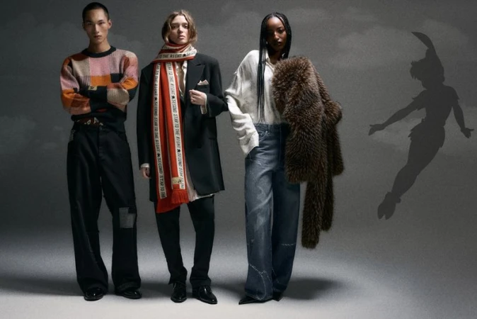 Three diverse fashion models pose in modern streetwear against a grey backdrop, with a shadow graphic of Peter Pan visible on the wall.