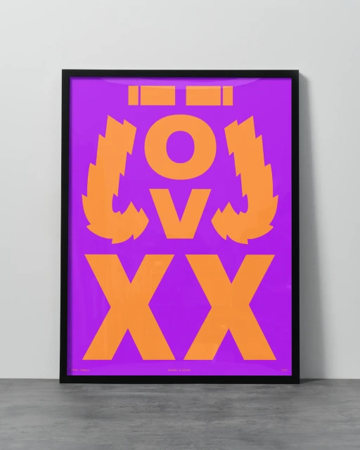 Graphic art print in black frame against white wall: orange abstract text and shapes on purple background, flat lay composition.