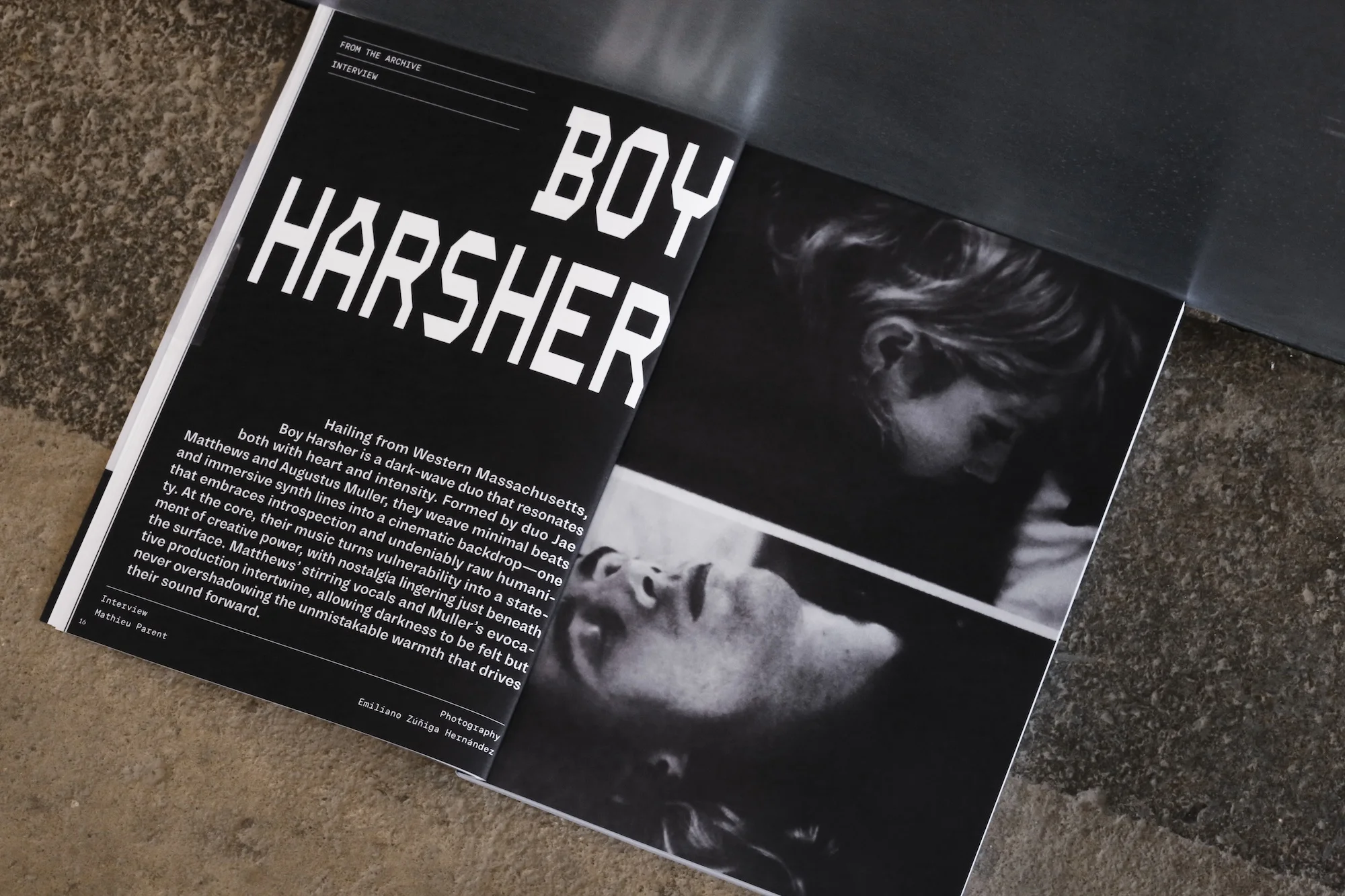Open magazine displaying black and white portraits and text. Includes close-up faces, article excerpts and bold text.