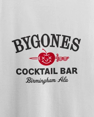 Graphic logo for Bygones Cocktail Bar featuring curved typography, a red pierced apple icon, and light fabric texture background.