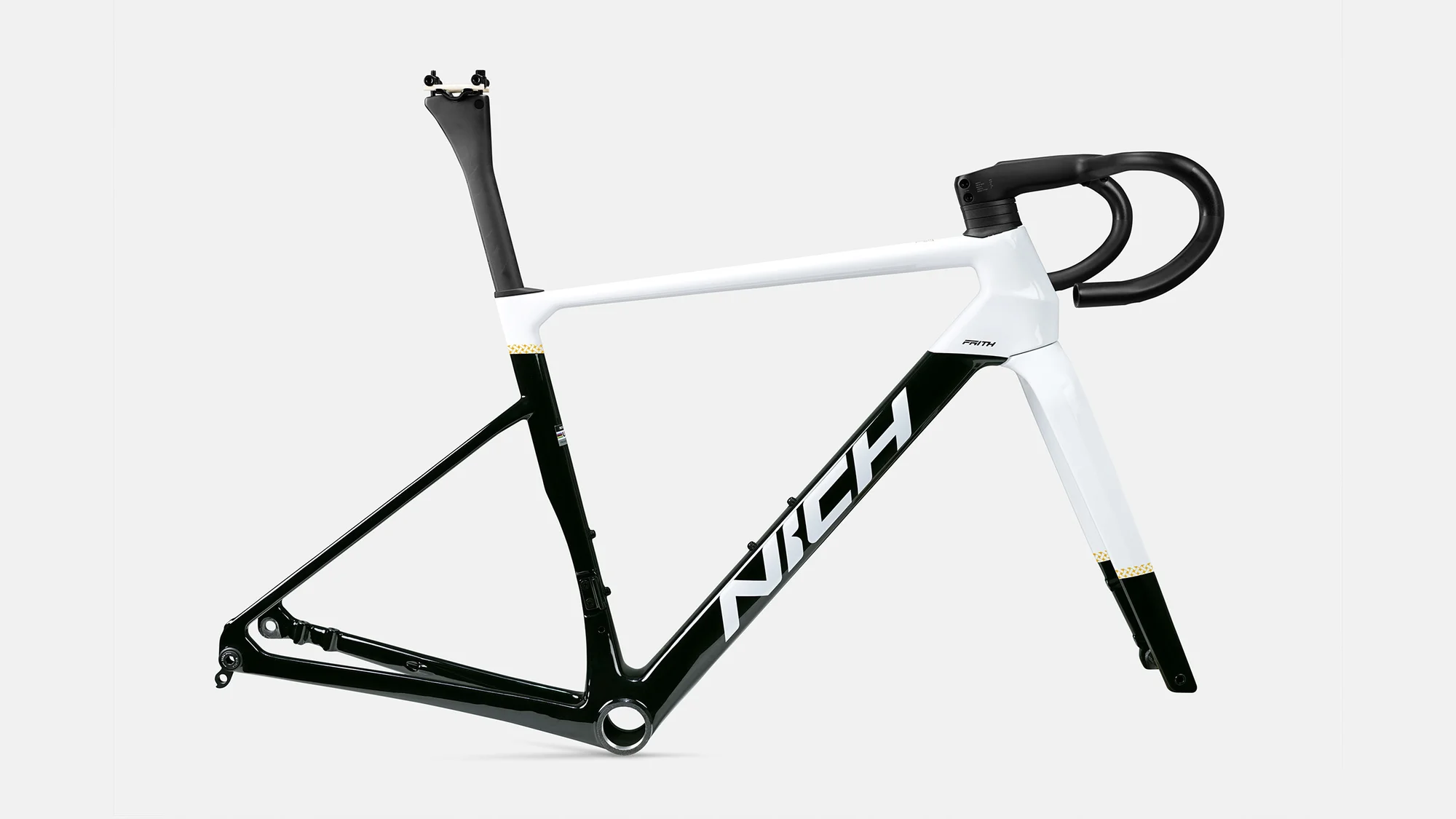 Black and white NICR Zirth road bike frame with handlebars, fork, and seat post, isolated on a white background in a studio shot.