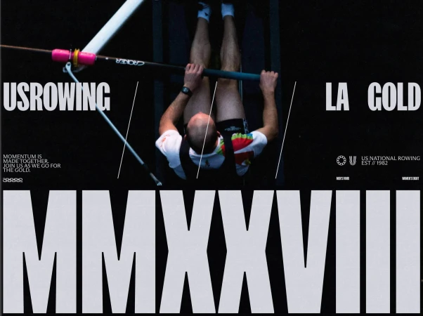 Overhead shot of a rower in a boat with oars, promoting US Rowing and LA Gold, and text mentioning the year 2028 in black and white.