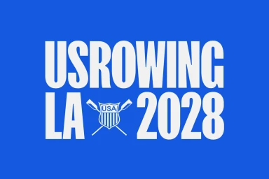USRowing LA 2028 brand identity graphic featuring bold white typography and a USA shield icon on a solid blue background.