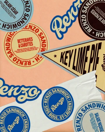 Renzo Sandwich advertisement featuring an array of circular and triangular stickers with various sandwich fillings and the brand's logo.