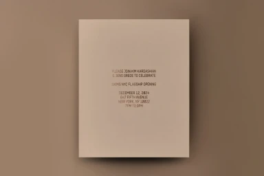 Minimalist printed invitation card for SKIMS NYC flagship opening centered on a solid neutral background.